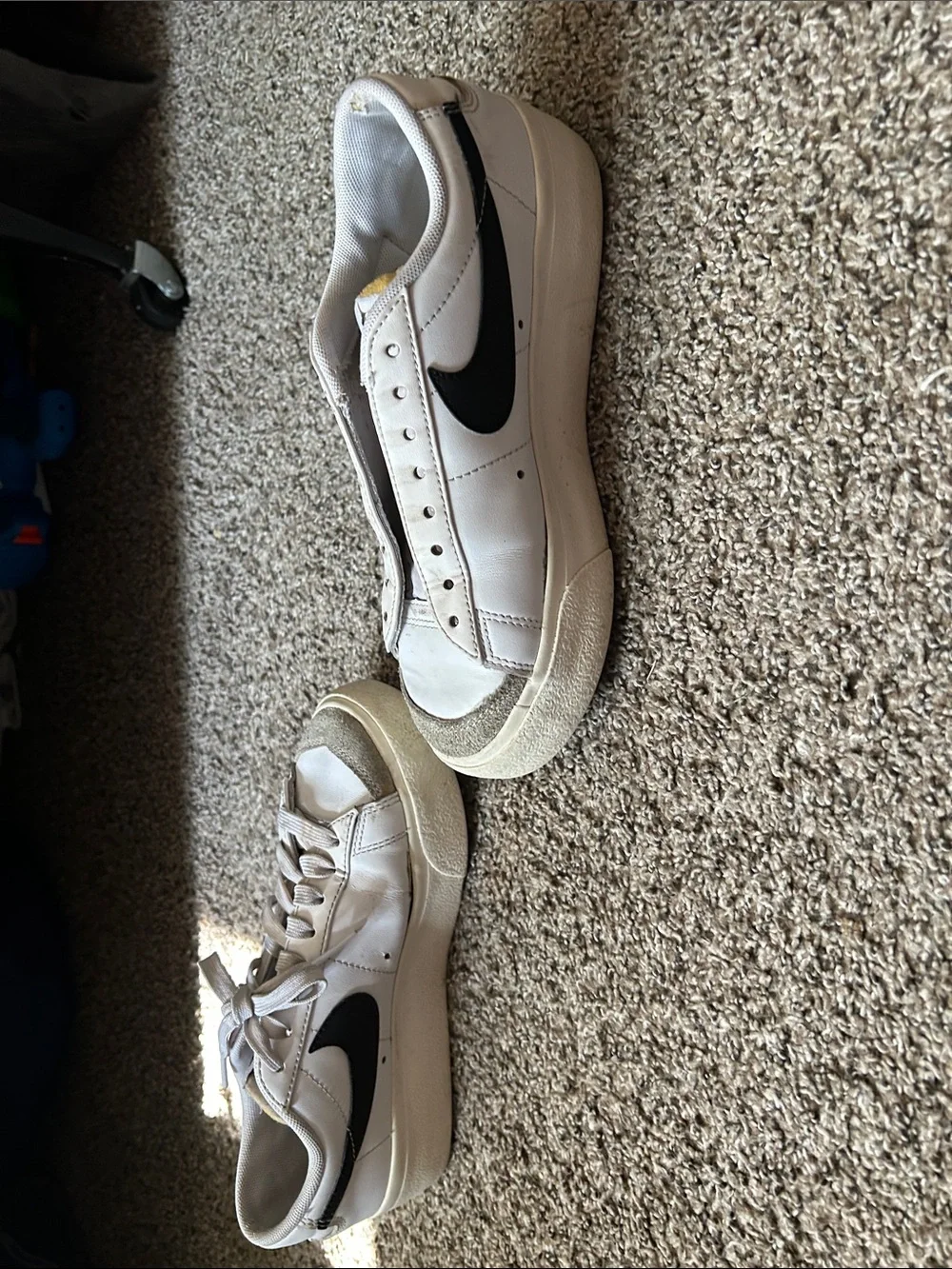 Nike White Sneakers with Black Swoosh and Yellow Tongue